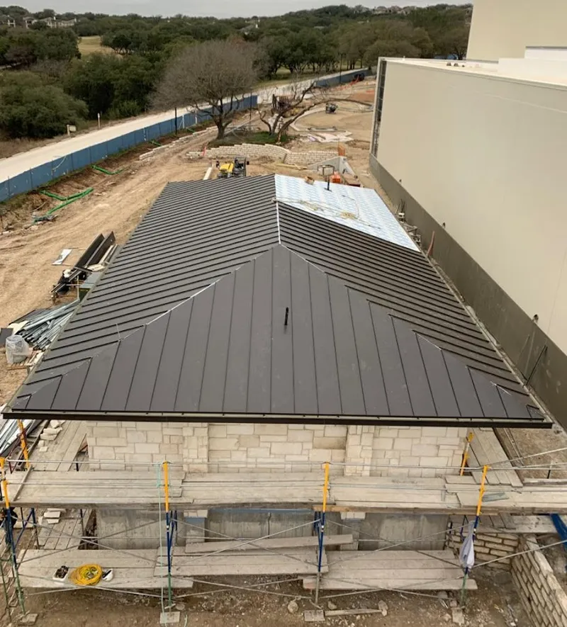 Metal roof new construction with scaffolding in Harahan